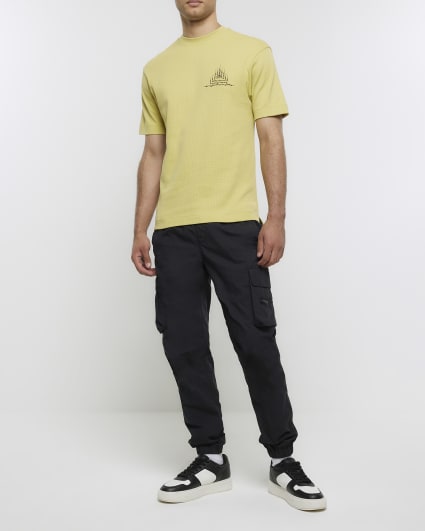 Yellow regular fit textured graphic t-shirt