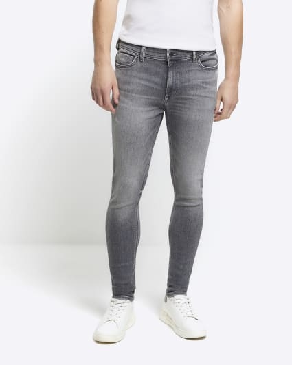 Grey super skinny spray on faded jeans