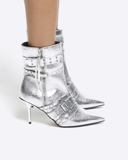 Silver buckle heeled ankle boots