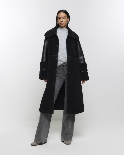 Black longline shearling coat