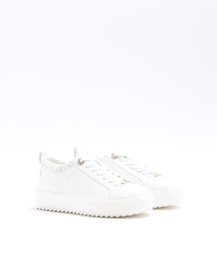White embossed elasticated trainers