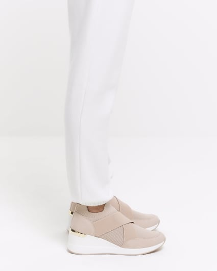 Pink knitted wedge shoes