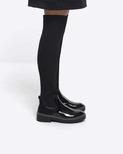Black knitted high leg boots