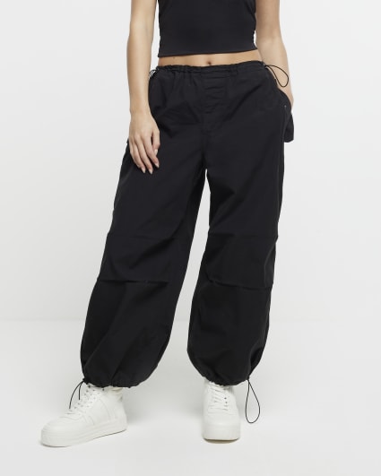 Petite black low rise parachute trousers