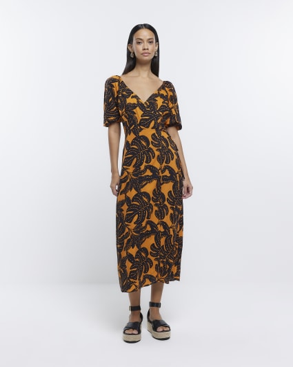 Orange leaf print wrap midi dress