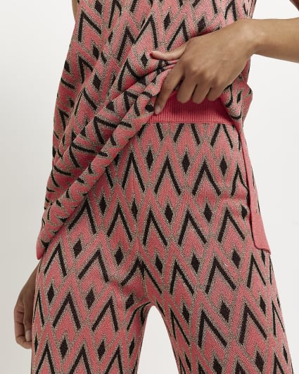 Pink print knit flared trousers