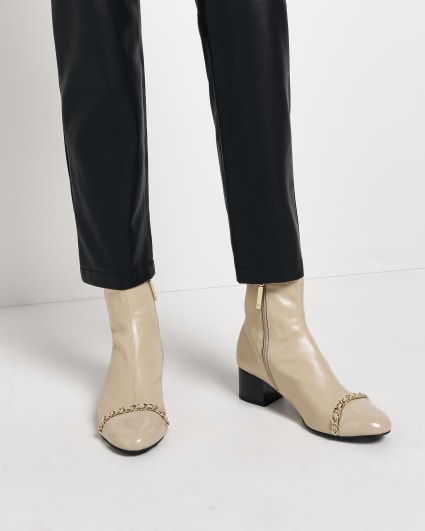 Cream chain heeled ankle boots