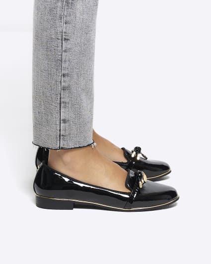Black patent knot detail loafers