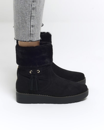 Black faux fur lining wedge boots