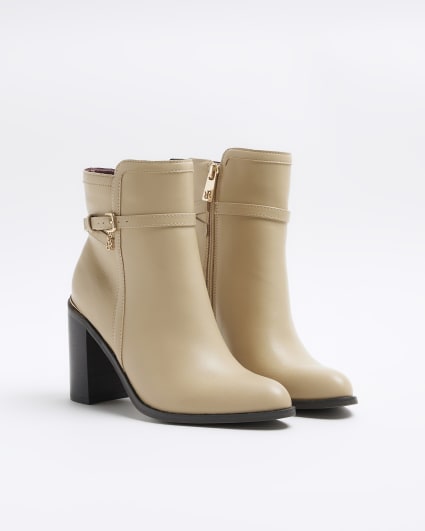 Cream buckle heeled boots
