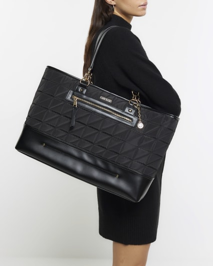 Black quilted zip pocket shopper bag