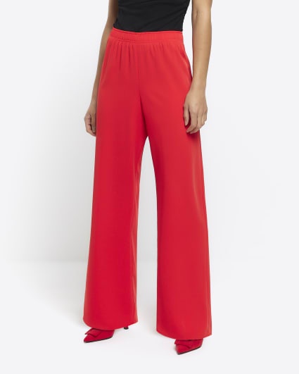Red elasticated wide leg trousers