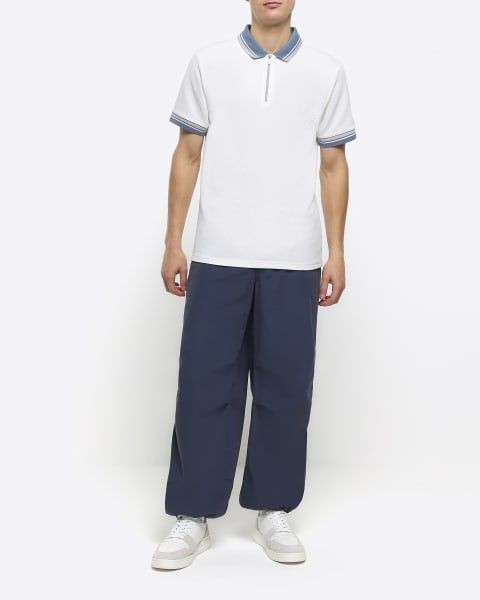 Ecru slim fit taped half zip polo