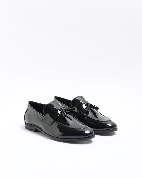 Black patent tassel loafers