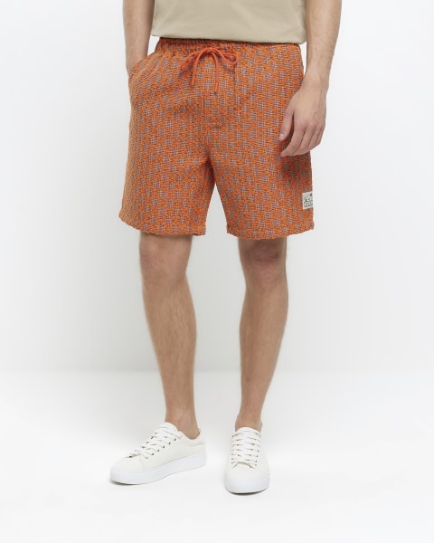 Orange regular fit textured shorts