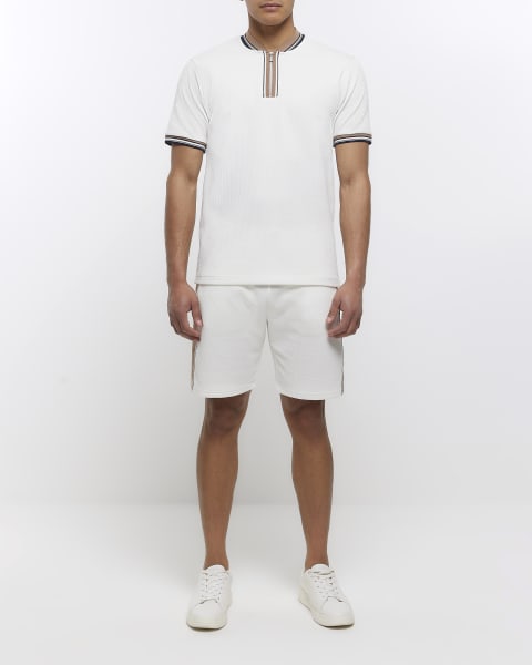 Ecru slim fit textured taped polo shirt