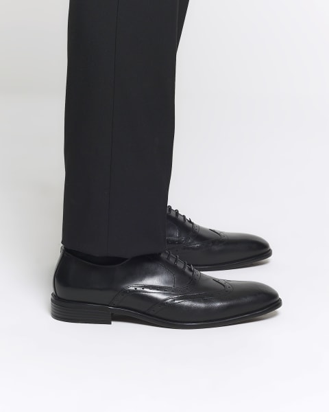 Black brogue derby shoes