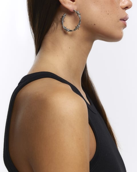 Silver barbed wire hoop earrings