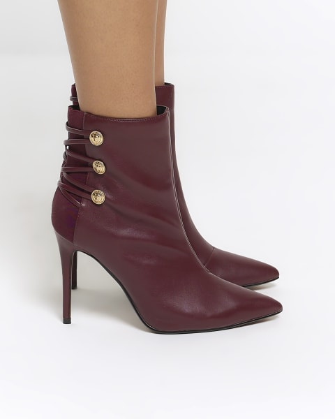 Red tie up heeled boots