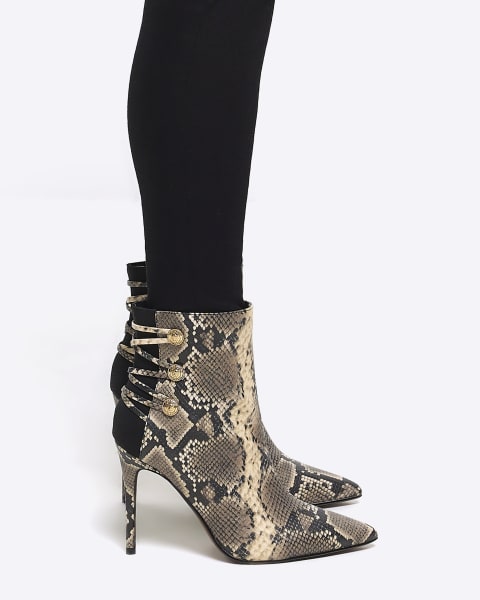 Beige animal print tie up heeled boots