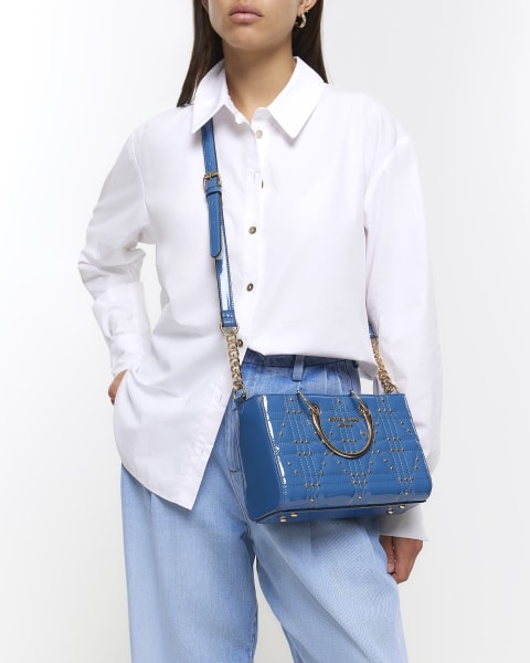 Blue patent studded tote bag