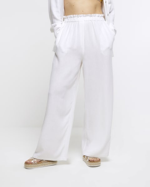 White wide leg trousers with linen