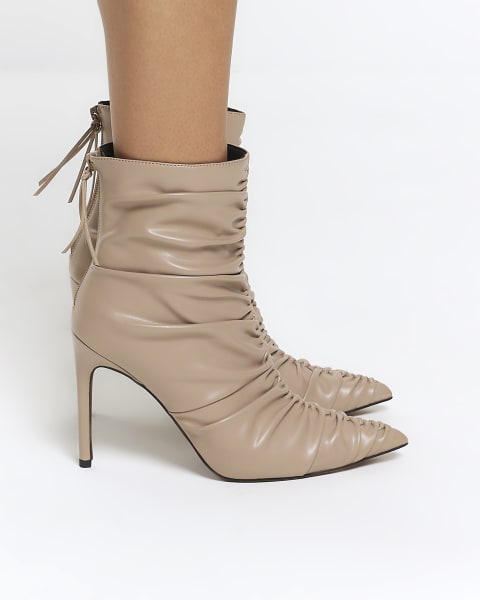 Beige ruched heeled ankle boots