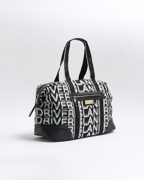 Black jacquard RI monogram travel bag