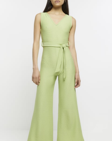 Green belted flare jumpsuit