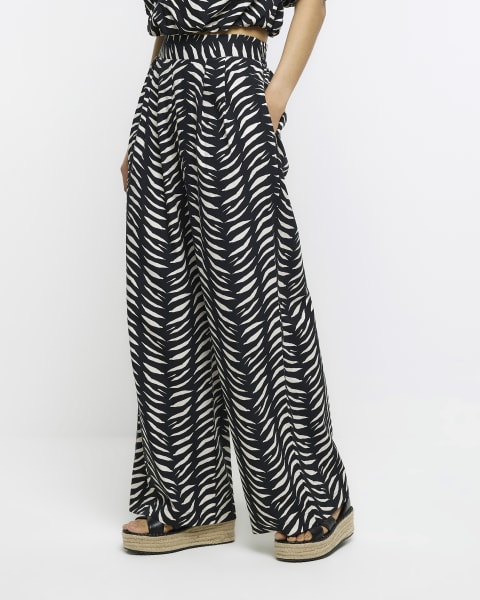 Black abstract print wide leg trousers