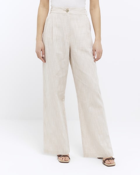 Beige pleated wide leg trousers