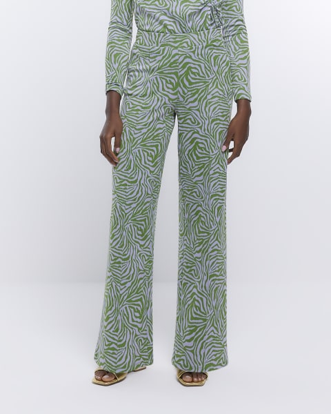 Green animal print wide leg trousers