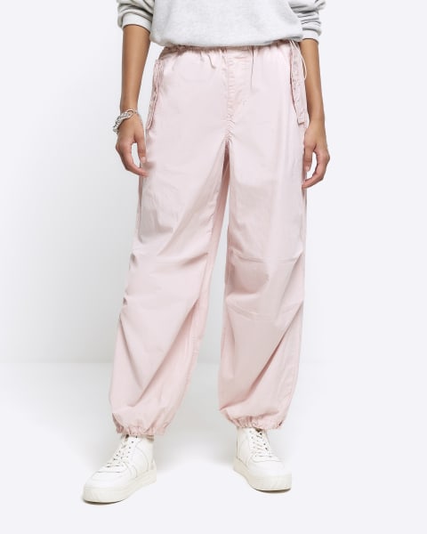 Pink low rise parachute trousers
