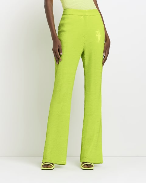 Lime green sequin flared trousers