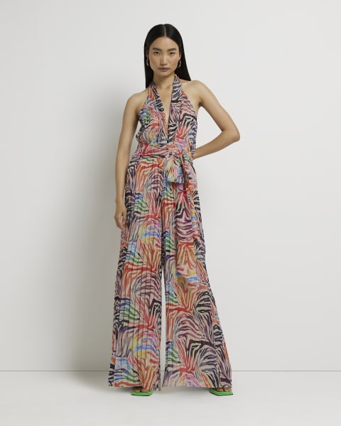 Orange printed wide halter neck leg jumpsuit