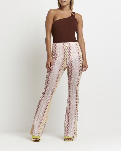 Petite pink knitted flare trousers