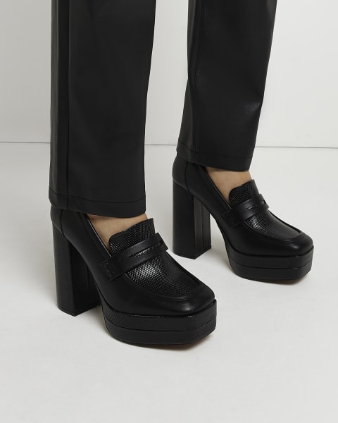 Black platform heeled loafers