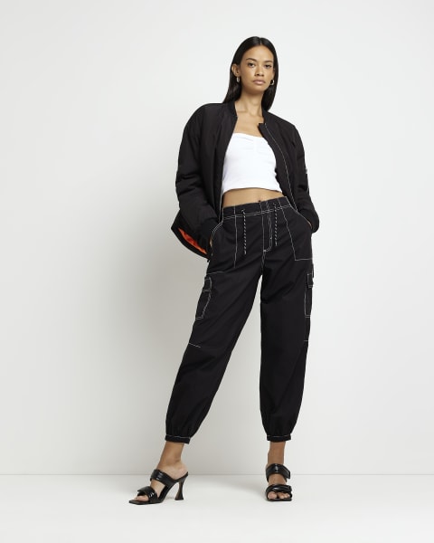 Black mid rise tapered parachute trousers