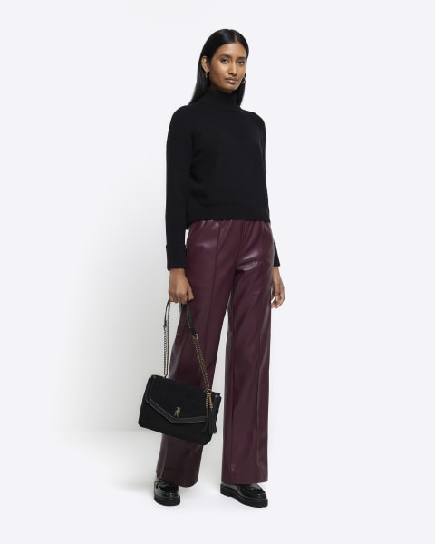 Black rib roll neck jumper