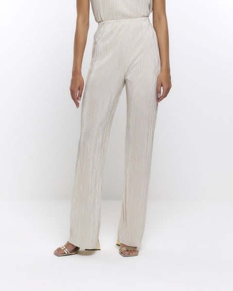 Cream plisse flared trousers