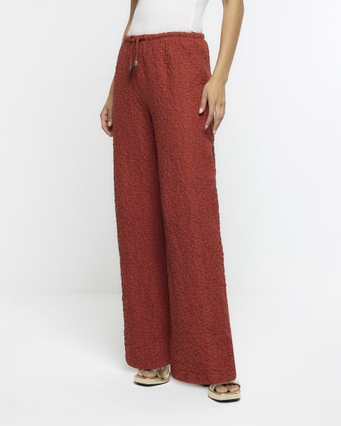 Rust textured wide leg trousers