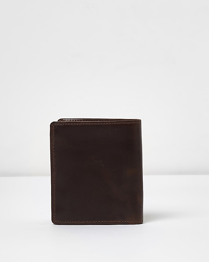 Dark brown leather fold out wallet