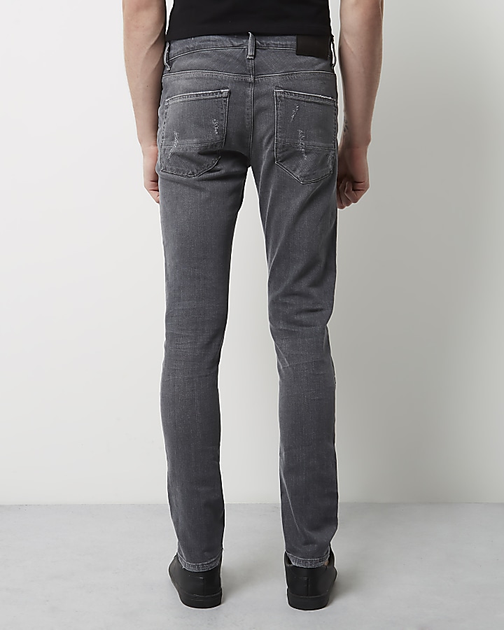 Grey skinny jeans with rips