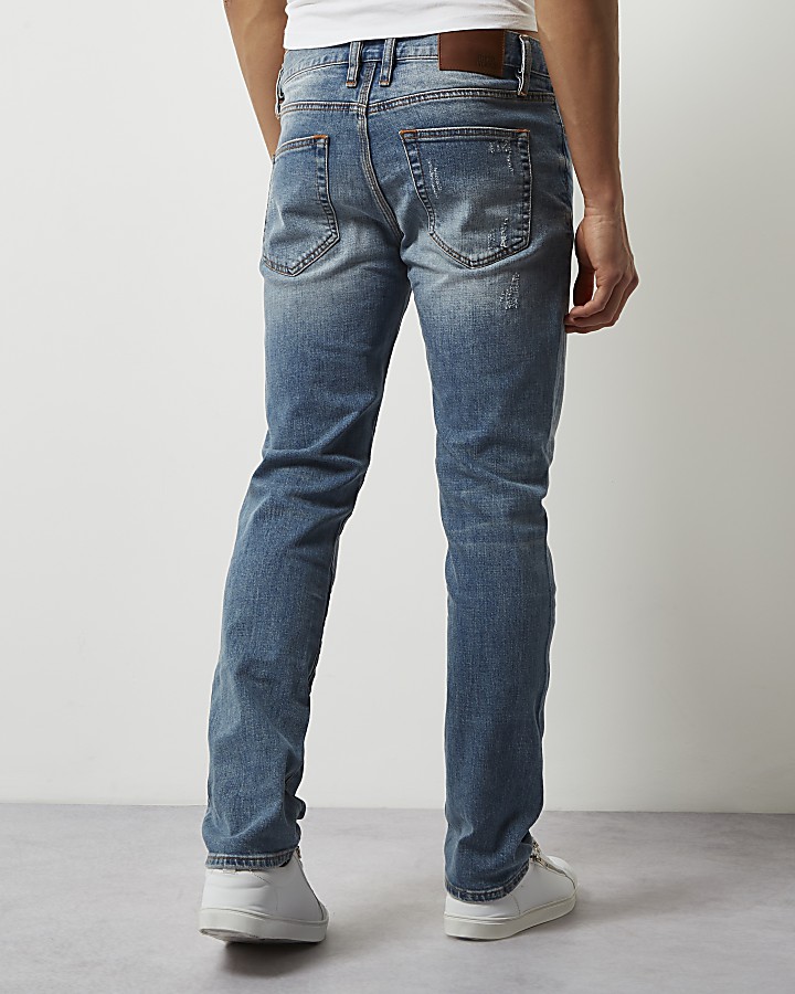 Blue wash Dylan slim fit ripped jeans