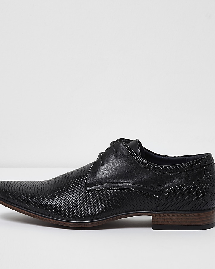 Black perforated formal shoes