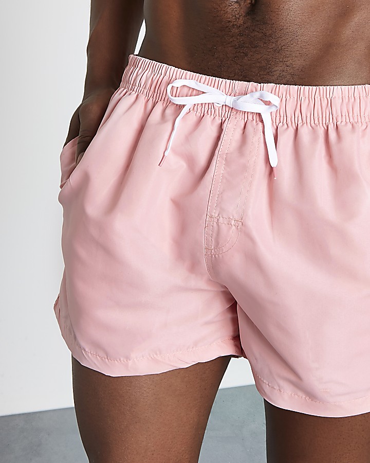 Light pink swim shorts