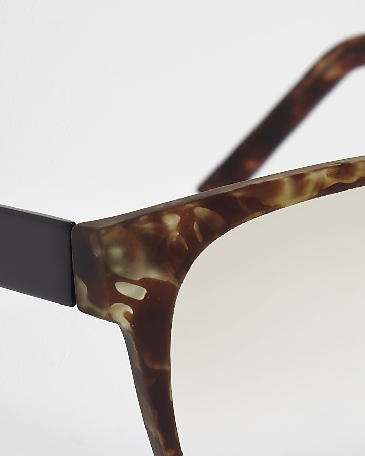 Brown tortoiseshell clear lenses sunglasses