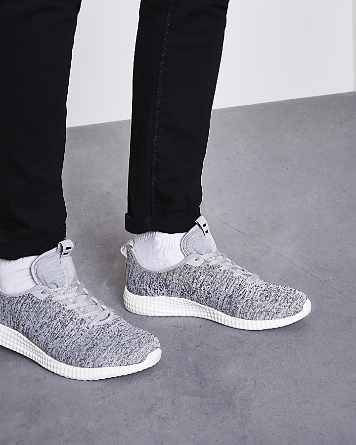 Grey knitted lace-up trainers