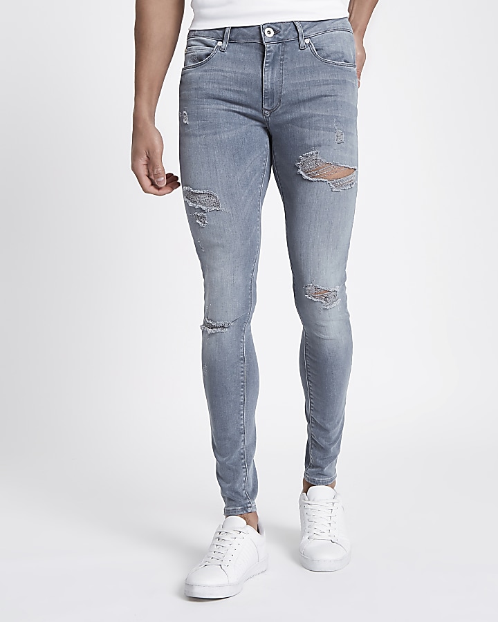 Blue ripped Ollie super skinny spray on jeans