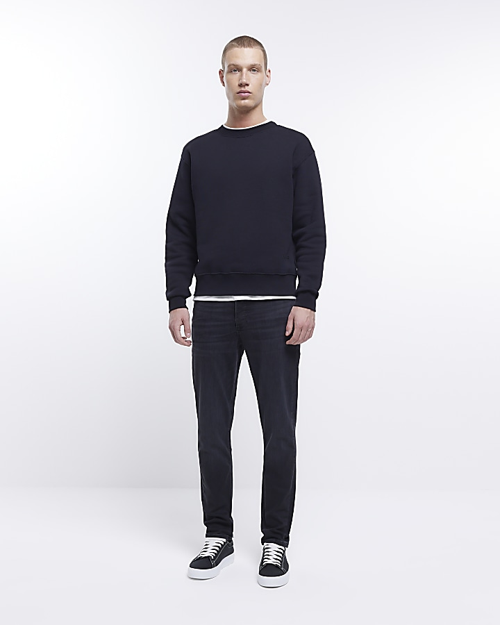 Black slim fit faded jeans | River Island